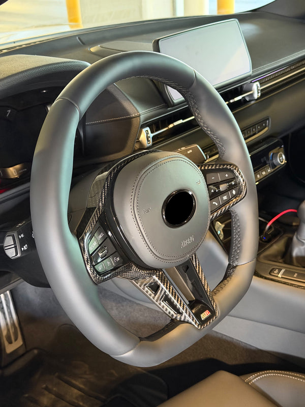GR Supra Manual G8X Style Smooth Leather with Carbon Fiber Steering Wheel