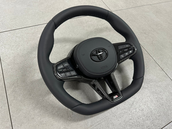 GR Supra A91-MT Edition G8X Style Smooth Leather with Carbon Fiber Steering Wheel